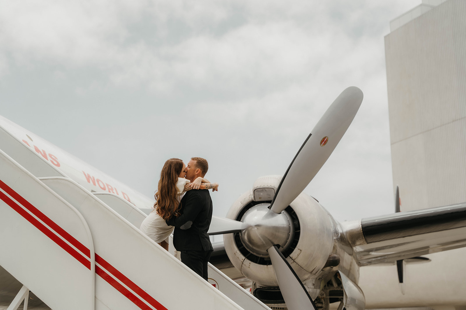 Couple at airport TWA engagement session in new york city